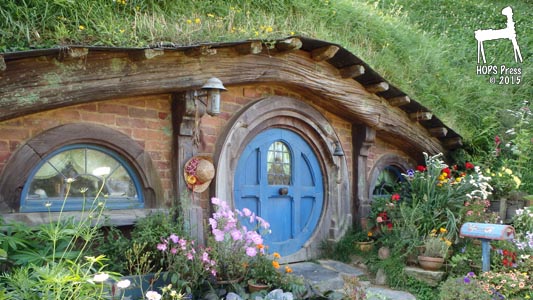 Hobbit house with timberframe and brick walls.