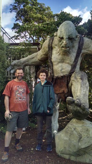 Posing with a stone troll.