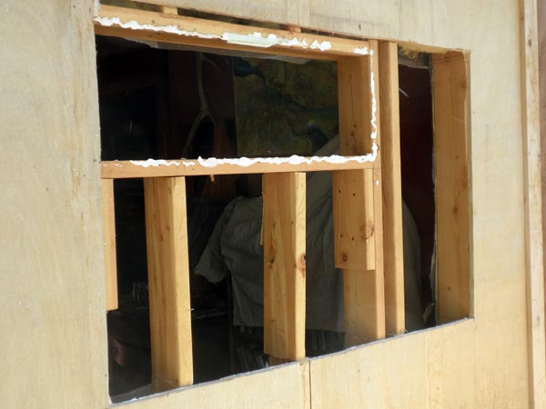 Cutting hole for a larger window.