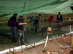 Rehl House: Concrete floor poured.