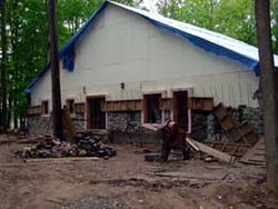 Rehl House: Slipform stone backwall.