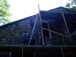 Rehl House: Hauling rocks to the third floor.