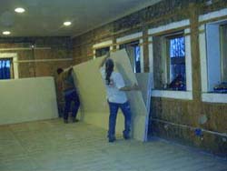 Rehl House: drywalling. ALIGN=CENTER WIDTH=