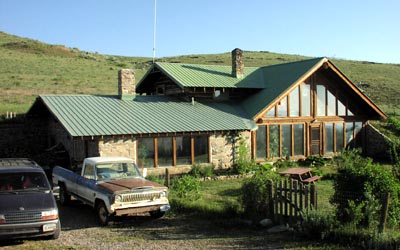 Finished Stone and Log Home.