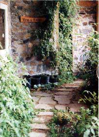 Slipform Stone greenhouse.