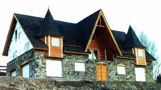 Slipform Stone Masonry: The Next Generation of Stone House Construction