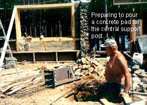Preparing to pour concrete pad for central support.