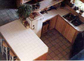 Bird's eye view of Kitchen with terra tile floor.