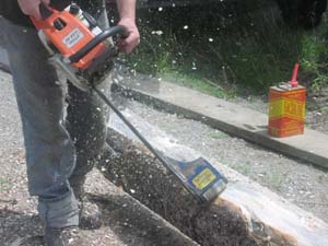 Peeling logs with a Log Wizard.