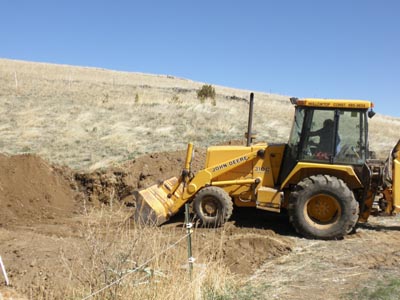 Excavationg a building site.