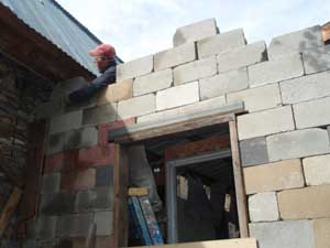 Angle iron to bridge gap between house and garage.