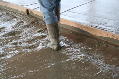 Pouring concrete slab ground floor.