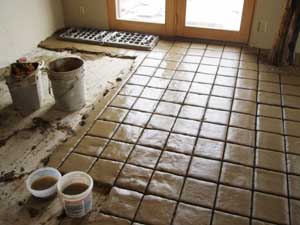 Terra tile floor with fresh mortar.
